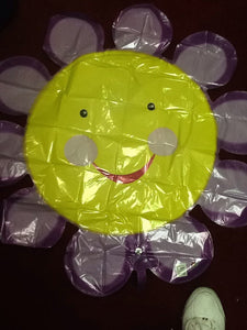 XL smiling purple flower - Titan Magic & Brain Busters Escape Rooms