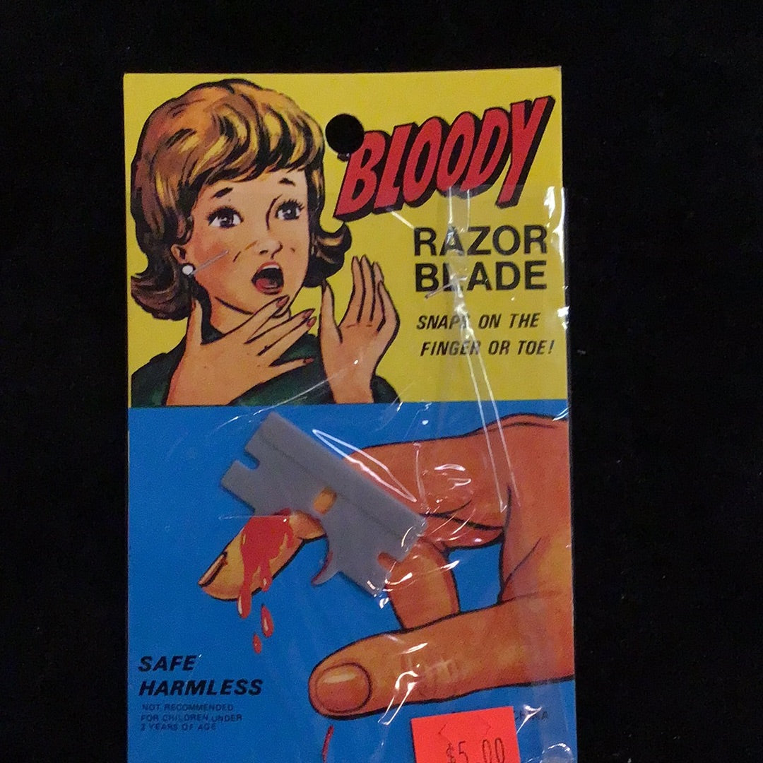 Bloody razor blade gag